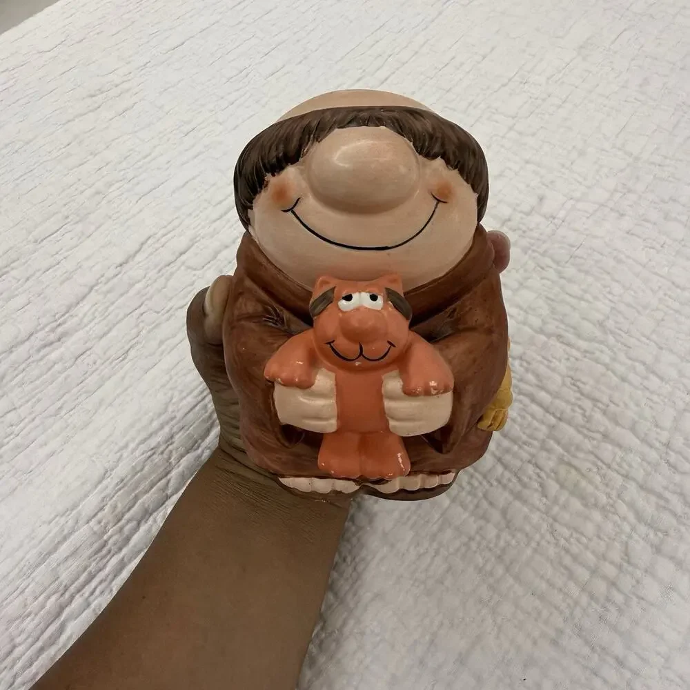 Wind-Up Ziggy Cartoon Figurine Smiling Padre Holding Dog Ceramic/Wood Brown